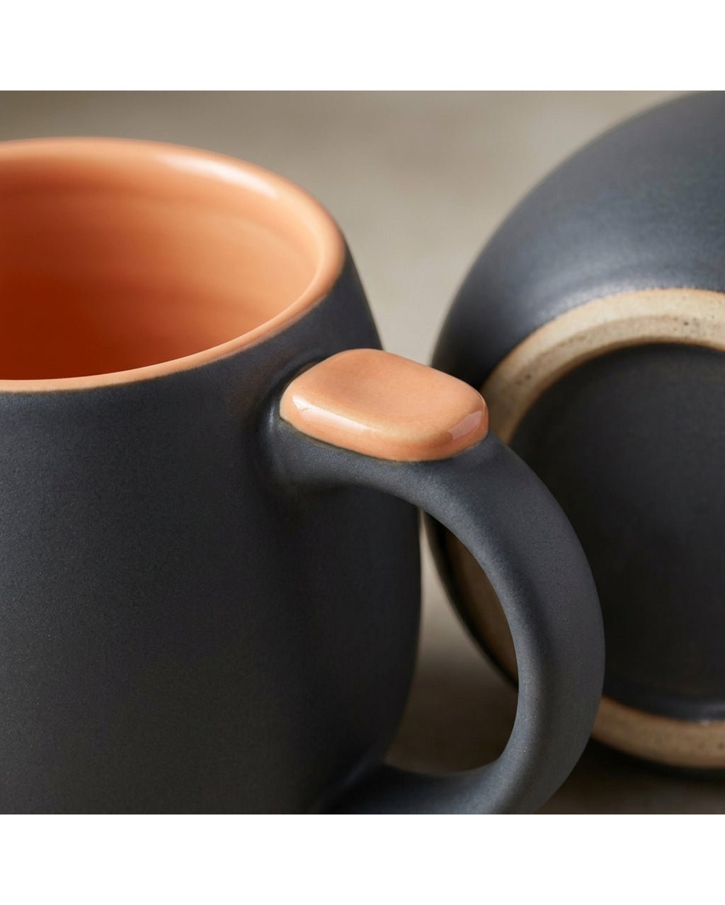Wvkmb Wide Belly Thumb-Rest Ceramic Coffee Mug 16 oz Charcoal Apricot - Detail view